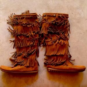 Moccasin style boots.
